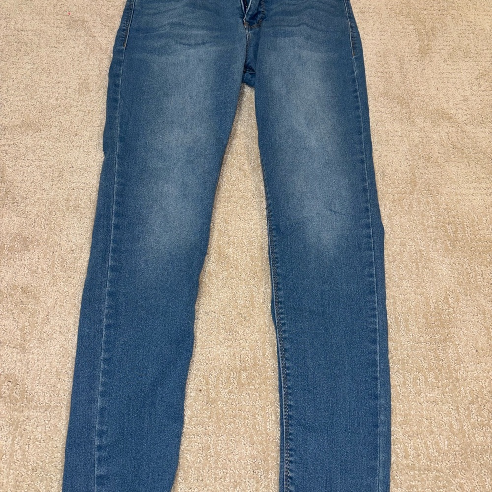 Sleek Blue Skinny Jeans with Subtle Whiskering
